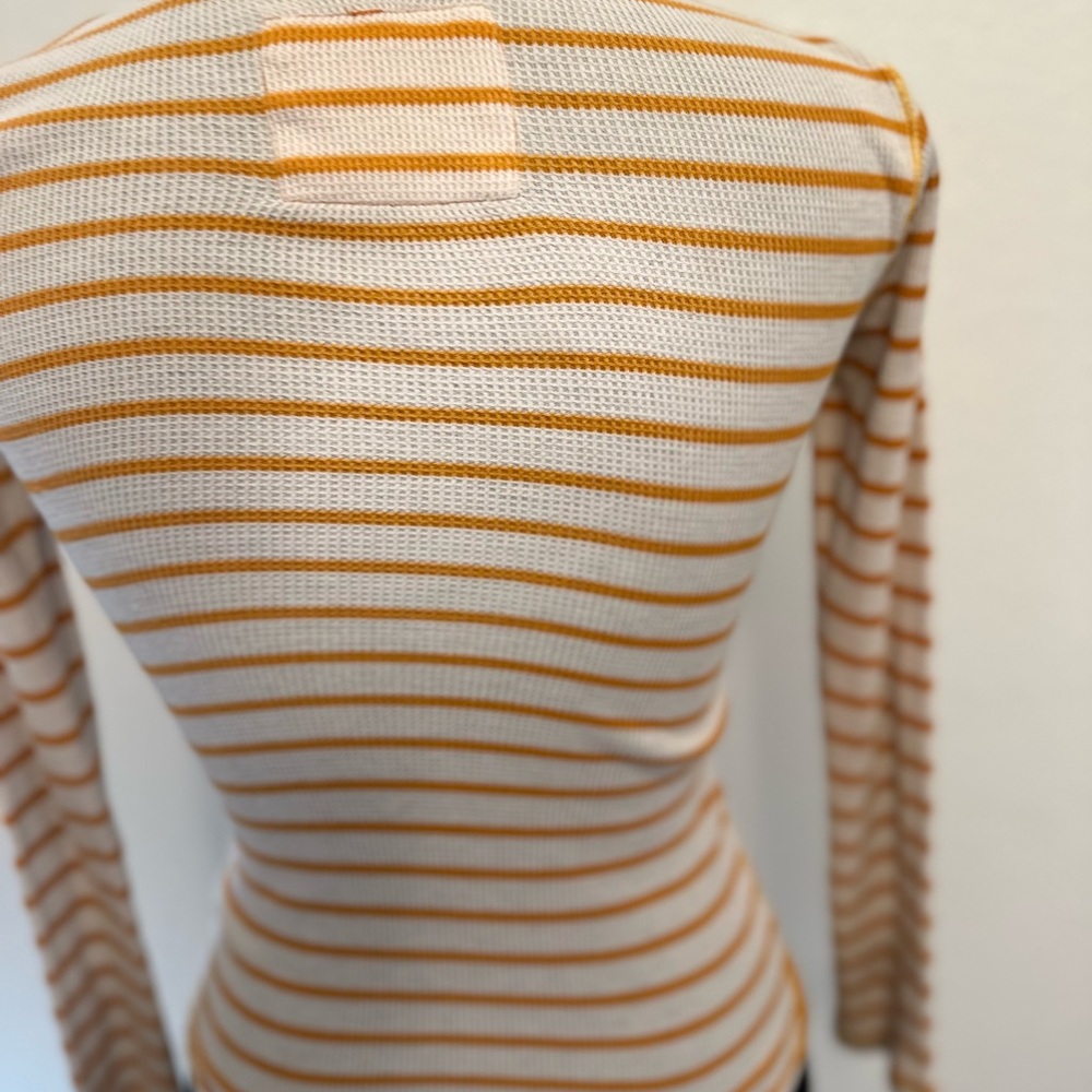 Orange and white striped shirt with buttons